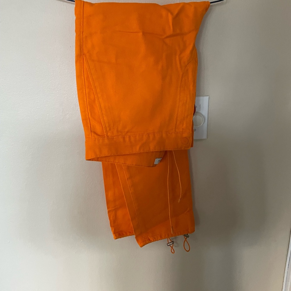 Zara orange jeans with drawstring at ankle.